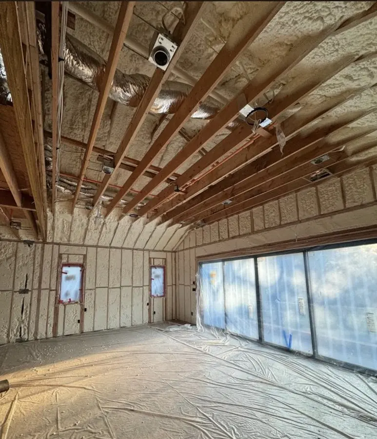 Interior walls and ceiling insulated with spray foam during new construction in Dayton
